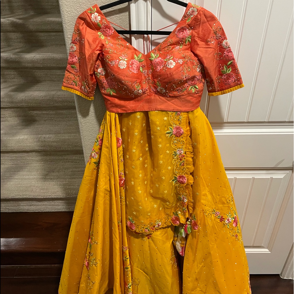 Peach And Yellow Lengha With Floral Design
